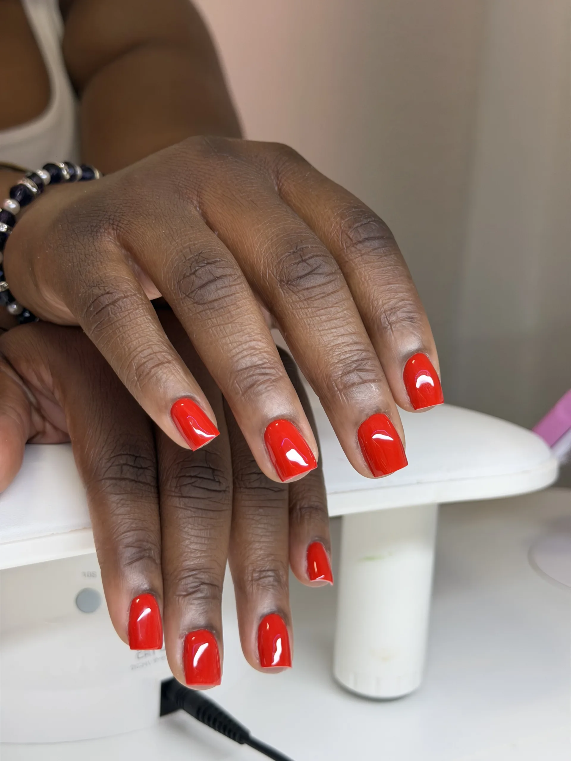 Bright red glossy square manicure