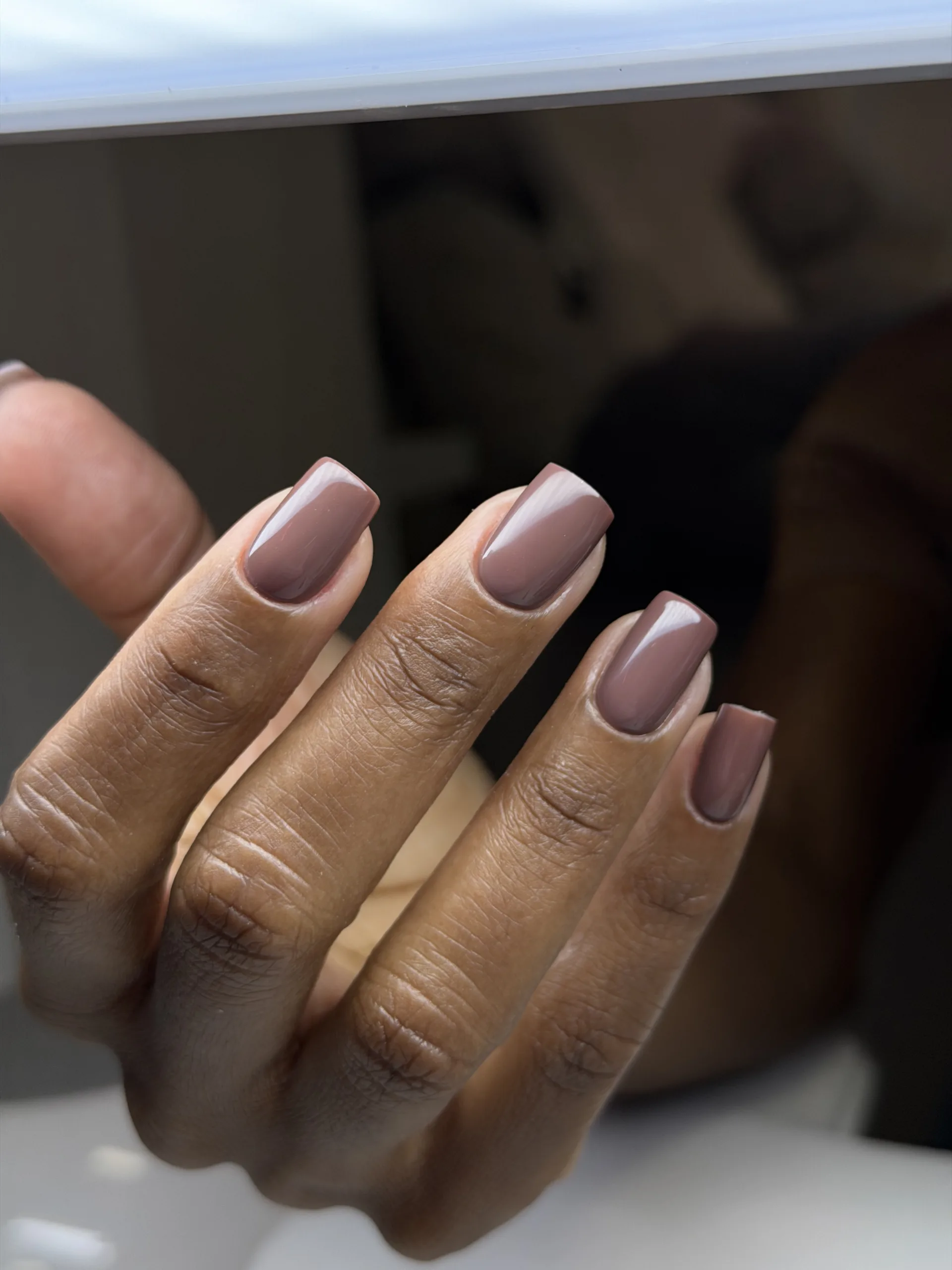 Glossy mauve square nails with subtle French tips